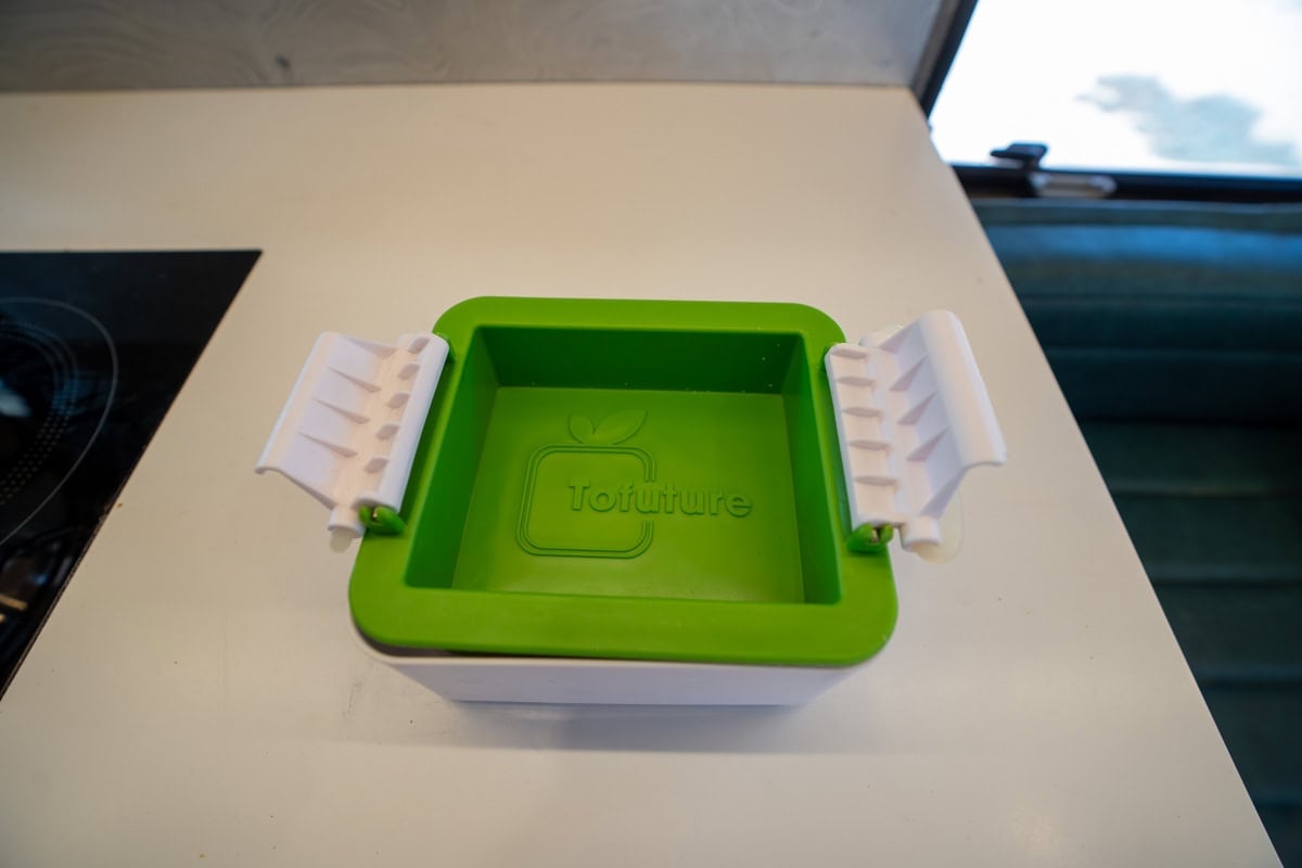 tofu press on counter in camper van